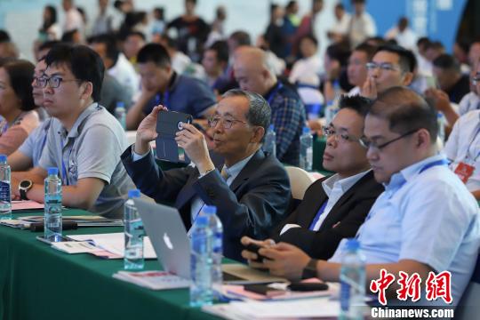 研討會現(xiàn)場圖?！■暮陚?攝