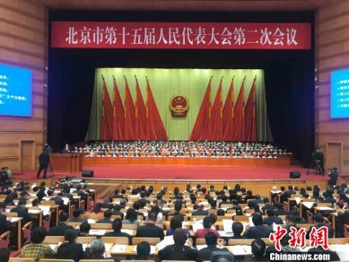 北京市十五屆人大二次會議14日開幕。北京市長陳吉寧向大會作政府工作報告?！∫?攝